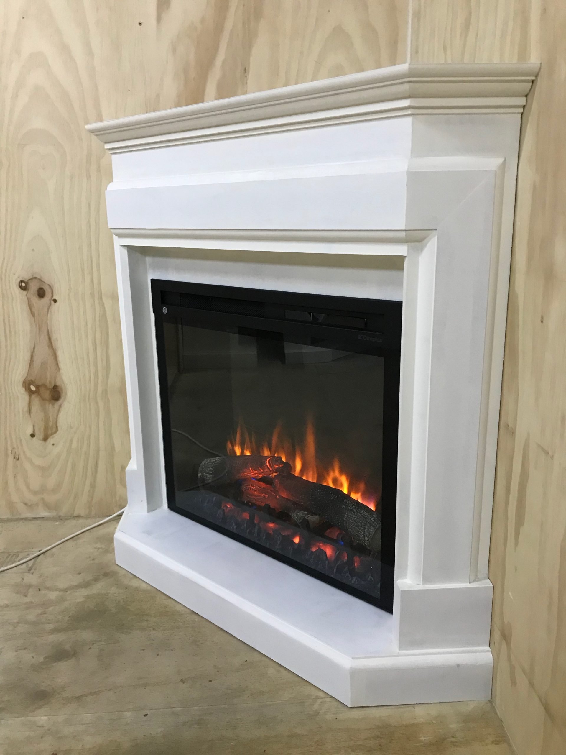 Hoekschouw met Dimplex Firebox XHD28 elektrische haard, ruimtebesparend ontwerp voor moderne interieurs